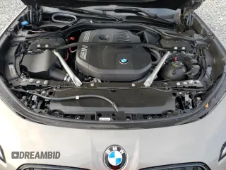 2024 BMW 7 Series 740i z VIN WBA23EH08RCS95536, wystawiony jako Copart lot #52499895 z przebiegiem 3 826 mil mil oraz Nie do naprawy • Non repairable. Historia ofert i sprzedaży dostępna na DreamBid. Obrazek 11.