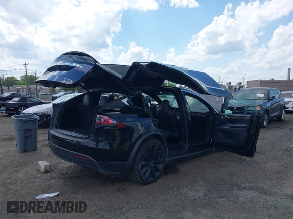 2019 Tesla Model X 75D with VIN 5YJXCBE21KF180203, listed as a IAAI auction lot 42190255 with 114,294 mi miles and . Bid and sale history available at DreamBid. Image 21.