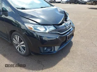 2015 Honda Fit EX-L with VIN 3HGGK5H89FM706018, listed as a IAAI auction lot 42417637 with 36,556 mi miles and . Bid and sale history available at DreamBid. Image 19.