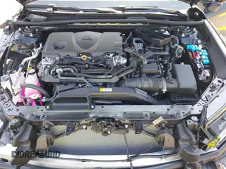 2025 Toyota Camry LE with VIN 4T1DAACK8SU125496, listed as a IAAI auction lot 42206200 with 937 mi miles and . Bid and sale history available at DreamBid. Image 10.
