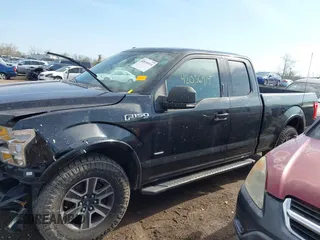 2015 Ford F-150 XLT with VIN 1FTEX1EP1FFC73368, listed as a IAAI auction lot 42036914 with 114,916 mi miles. Bid and sale history available at carsss.com. Image 14.