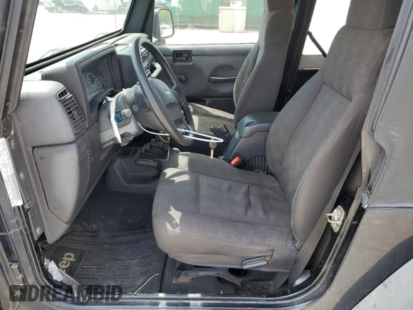 2004 Jeep Wrangler SE with VIN 1J4FA29124P796031, listed as a Copart auction lot 56875525 with 239,488 mi miles and Clean title. Bid and sale history available at DreamBid. Image 7.