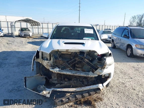 2018 Toyota Tacoma SR5 with VIN 3TMAZ5CN4JM062272, listed as a IAAI auction lot 41671472 with 114,566 mi miles and . Bid and sale history available at DreamBid. Image 13.