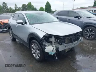 2021 Mazda CX-30 Premium with VIN 3MVDMADL7MM252507, listed as a IAAI auction lot 42338625 with 44,537 mi miles and . Bid and sale history available at DreamBid. Image 1.