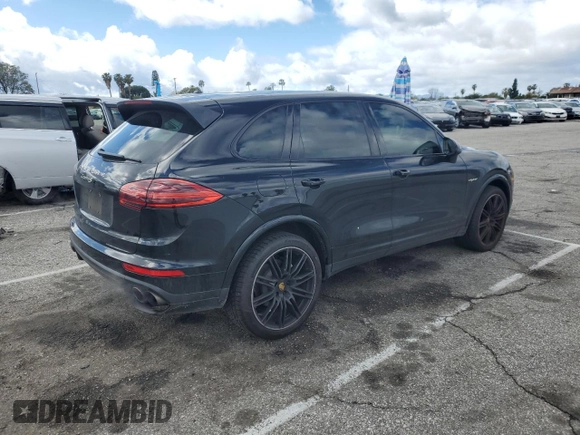 2017 Porsche Cayenne S E-Hybrid with VIN WP1AE2A26HLA74128, listed as a Copart auction lot 46486355 with 57,482 mi miles and Salvage title. Bid and sale history available at DreamBid. Image 3.