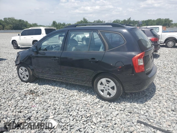 2009 Kia Rondo LX with VIN KNAFG528097250880, listed as a Copart auction lot 52632615 with 127,228 mi miles and Salvage Title. Bid and sale history available at carsss.com. Image 2.