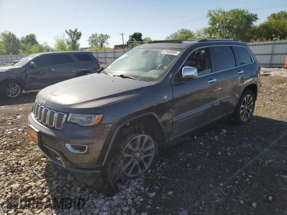 2017 Jeep Grand Cherokee Overland with VIN 1C4RJFCG0HC762612, listed as a Copart auction lot 57400095 with 122,702 mi miles and Salvage title. Bid and sale history available at DreamBid. Image 1.