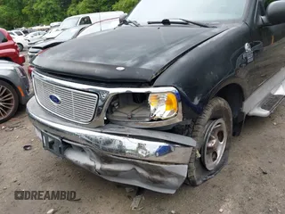 2003 Ford F-150 XL with VIN 1FTRX07W73KD29879, listed as a IAAI auction lot 42356048 with Not provided miles and . Bid and sale history available at DreamBid. Image 6.