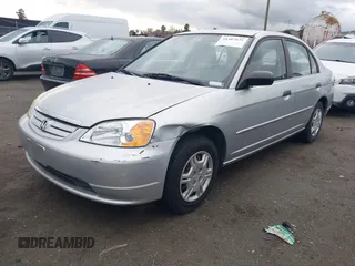 2001 Honda Civic LX with VIN 2HGES15561H561957, listed as a IAAI auction lot 41487631 with 214,529 mi miles. Bid and sale history available at carsss.com. Image 2.