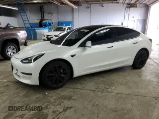 2021 Tesla Model 3 Standard Range Plus z VIN 5YJ3E1EA4MF943036, wystawiony jako Copart lot #54008355 z przebiegiem 62 981 mil mil oraz Szkoda całkowita • Salvage title. Historia ofert i sprzedaży dostępna na DreamBid. Obrazek 1.