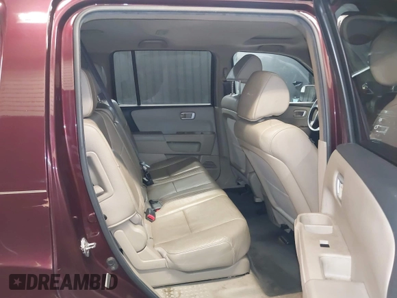 2012 Honda Pilot EX-L with VIN 5FNYF4H55CB018315, listed as a IAAI auction lot 42051230 with 121,702 mi miles and . Bid and sale history available at DreamBid. Image 8.
