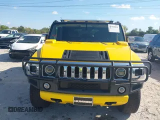2003 Hummer H2 with VIN 5GRGN23U93H108017, listed as a IAAI auction lot 41793034 with 203,739 mi miles. Bid and sale history available at carsss.com. Image 6.