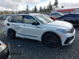 2023 Volkswagen Tiguan SE R-Line Black with VIN 3VVCB7AX3PM014446, listed as a IAAI auction lot 42016885 with 12,726 mi miles and . Bid and sale history available at DreamBid. Image 13.