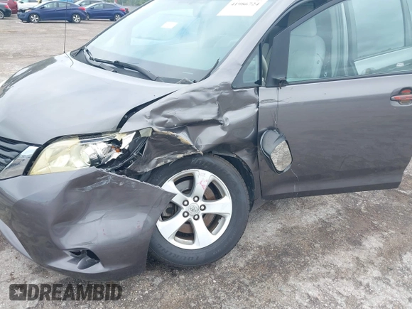 2014 Toyota Sienna LE AAS with VIN 5TDKK3DC9ES448461, listed as a IAAI auction lot 41986724 with 102,930 mi miles and . Bid and sale history available at carsss.com. Image 6.