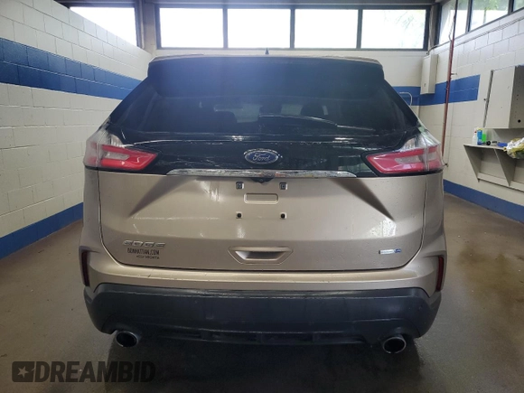 2020 Ford Edge SE с VIN 2FMPK4G94LBA07908, выставлен на аукционе Copart как лот 59572605 с пробегом 110 989 миль миль и Списание • Salvage title. История ставок и продаж доступна на DreamBid. Изображение 6.