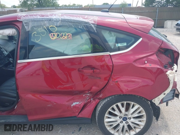 2017 Ford Focus Titanium with VIN 1FADP3N24HL294690, listed as a IAAI auction lot 39893510 with 123,089 mi miles and . Bid and sale history available at DreamBid. Image 13.