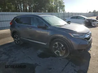 2019 Honda CR-V Touring with VIN 7FARW1H97KE001010, listed as a Copart auction lot 51944165 with 137,485 mi miles and Clean Title. Bid and sale history available at carsss.com. Image 4.