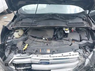 2017 Ford Escape SE z VIN 1FMCU0GD8HUE00754, wystawiony jako IAAI lot #42127911 z przebiegiem 169 487 mil mil oraz . Historia ofert i sprzedaży dostępna na DreamBid. Obrazek 10.
