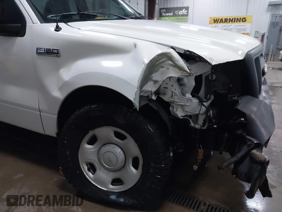 2007 Ford F-150 XL with VIN 1FTRF12267KC21885, listed as a IAAI auction lot 41278787 with 50,306 mi miles and . Bid and sale history available at DreamBid. Image 6.