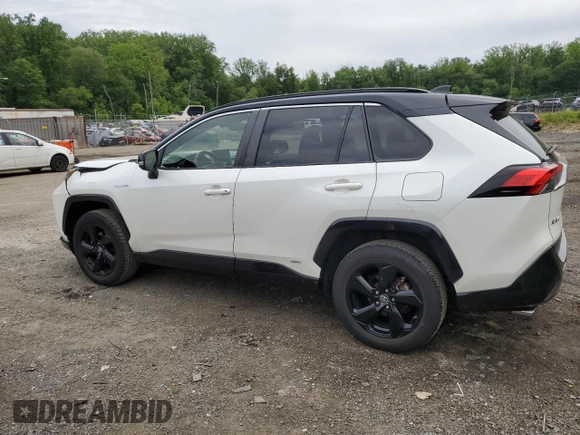 2019 Toyota RAV4 Hybrid XSE with VIN JTMEWRFV4KJ004433, listed as a Copart auction lot 58400445 with 101,108 mi miles and Salvage title. Bid and sale history available at DreamBid. Image 2.