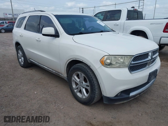 2011 Dodge Durango Crew with VIN 1D4RD4GG6BC730344, listed as a IAAI auction lot 42154714 with 211,903 mi miles and . Bid and sale history available at carsss.com. Image 1.