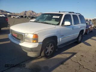2006 GMC Yukon SLE with VIN 1GKEC13Z86R138116, listed as a Copart auction lot 77707424 with 195,129 mi miles and Salvage Title. Bid and sale history available at carsss.com. Image 1.