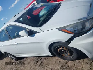 2014 Hyundai Accent GLS with VIN KMHCT4AE4EU590415, listed as a IAAI auction lot 41877817 with 169,285 mi miles. Bid and sale history available at carsss.com. Image 13.
