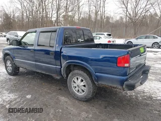 2002 GMC Sonoma SLS with VIN 1GTDT13W12K158613, listed as a IAAI auction lot 41524710 with 217,785 mi miles. Bid and sale history available at carsss.com. Image 14.