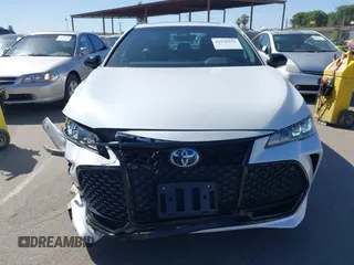 2019 Toyota Avalon Limited Hybrid z VIN 4T1B21FBXKU001178, wystawiony jako IAAI lot #42328222 z przebiegiem 72 204 mil mil oraz . Historia ofert i sprzedaży dostępna na DreamBid. Obrazek 12.