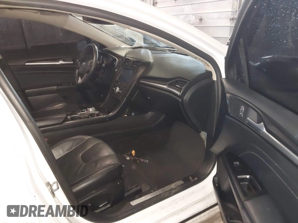 2019 Ford Fusion Titanium with VIN 3FA6P0D92KR153096, listed as a IAAI auction lot 41679393 with 127,292 mi miles and . Bid and sale history available at DreamBid. Image 5.