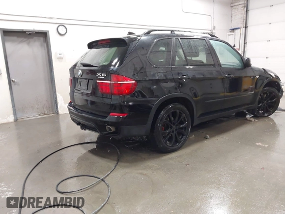 2012 BMW X5 35d z VIN 5UXZW0C58CL671740, wystawiony jako IAAI lot #41158203 z przebiegiem 97 451 mil mil oraz . Historia ofert i sprzedaży dostępna na DreamBid. Obrazek 4.