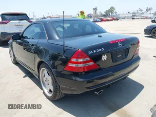 2001 Mercedes-Benz SLK 230/320 with VIN WDBKK65F81F218476, listed as a IAAI auction lot 42450368 with 121,640 mi miles and . Bid and sale history available at DreamBid. Image 3.