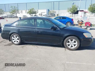 2003 Nissan Altima S with VIN 1N4AL11D93C268136, listed as a IAAI auction lot 41960386 with 181,444 mi miles. Bid and sale history available at carsss.com. Image 13.