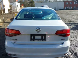 2017 Volkswagen Jetta 1.4T S with VIN 3VW167AJ9HM215563, listed as a IAAI auction lot 41473283 with 119,648 mi miles. Bid and sale history available at carsss.com. Image 16.