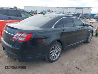 2013 Ford Taurus Limited with VIN 1FAHP2F80DG114817, listed as a IAAI auction lot 41429111 with 207,104 mi miles. Bid and sale history available at carsss.com. Image 4.