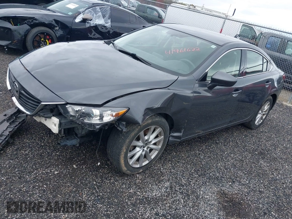 2016 Mazda 6 i Sport with VIN JM1GJ1U55G1472416, listed as a IAAI auction lot 41961622 with 157,315 mi miles and . Bid and sale history available at DreamBid. Image 2.