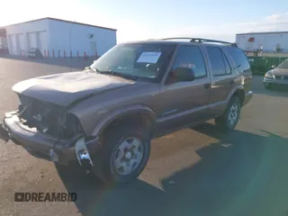 2004 Chevrolet Blazer LS z VIN 1GNDT13X74K143228, wystawiony jako IAAI lot #41761295 z przebiegiem 149 003 mil mil oraz . Historia ofert i sprzedaży dostępna na DreamBid. Obrazek 2.