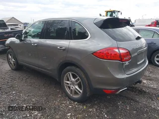 2014 Porsche Cayenne with VIN WP1AA2A24ELA05204, listed as a IAAI auction lot 41452829 with 179,285 mi miles and . Bid and sale history available at DreamBid. Image 3.