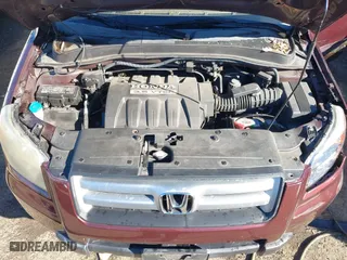 2007 Honda Pilot LX with VIN 2HKYF18167H510970, listed as a IAAI auction lot 40827681 with 119,011 mi miles. Bid and sale history available at carsss.com. Image 10.