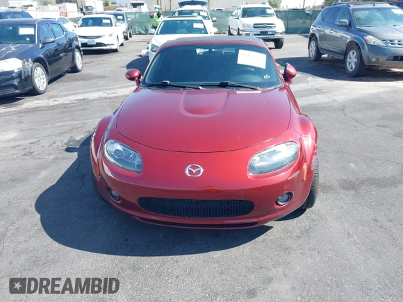 2006 Mazda MX-5 Miata Sport z VIN JM1NC25F260109008, wystawiony jako IAAI lot #42467176 z przebiegiem 139 839 mil mil oraz . Historia ofert i sprzedaży dostępna na DreamBid. Obrazek 6.