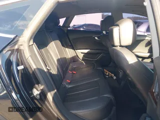2014 Audi A7 Premium Plus z VIN WAUWGAFC4EN092525, wystawiony jako IAAI lot #42331183 z przebiegiem 183 258 mil mil oraz . Historia ofert i sprzedaży dostępna na DreamBid. Obrazek 8.