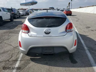 2014 Hyundai Veloster with VIN KMHTC6AD2EU186726, listed as a Copart auction lot 43993215 with 120,591 mi miles and Salvage Title. Bid and sale history available at carsss.com. Image 6.