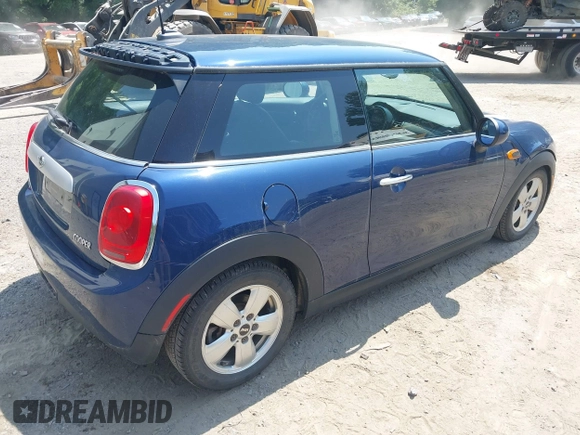 2014 MINI Hardtop with VIN WMWXM5C50ET972174, listed as a IAAI auction lot 42738144 with 106,273 mi miles and . Bid and sale history available at DreamBid. Image 4.