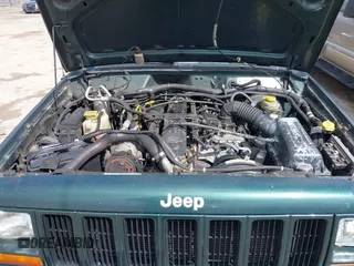 2000 Jeep Cherokee Classic with VIN 1J4FF58S3YL258755, listed as a IAAI auction lot 42020260 with 228,867 mi miles. Bid and sale history available at carsss.com. Image 10.