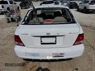 2002 Hyundai Accent GL with VIN KMHCG35C82U230535, listed as a Copart auction lot 77709454 with 116,200 mi miles and Non Repairable. Bid and sale history available at carsss.com. Image 6.