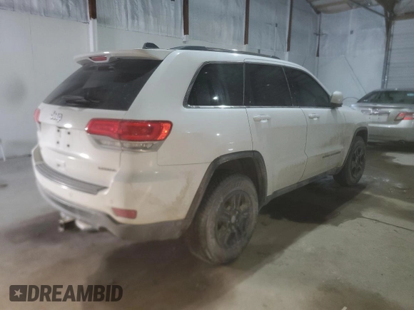 2017 Jeep Grand Cherokee Laredo with VIN 1C4RJFAGXHC632324, listed as a Copart auction lot 45951135 with 117,220 mi miles and Salvage title. Bid and sale history available at DreamBid. Image 3.