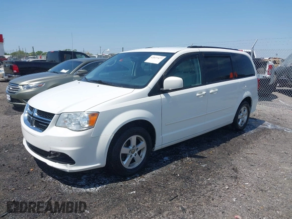 2012 Dodge Grand Caravan SXT with VIN 2C4RDGCG9CR200432, listed as a IAAI auction lot 42027477 with 99,076 mi miles and . Bid and sale history available at DreamBid. Image 18.
