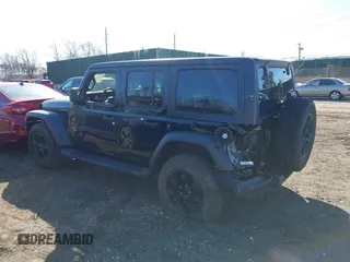 2023 Jeep Wrangler Sport S with VIN 1C4HJXDN6PW617814, listed as a IAAI auction lot 41810646 with 25,095 mi miles and . Bid and sale history available at DreamBid. Image 3.