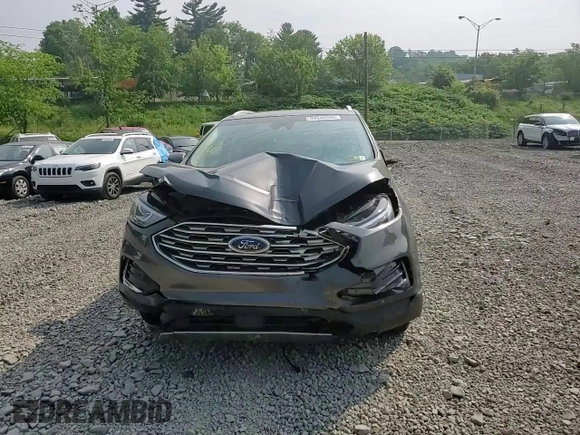2019 Ford Edge SEL with VIN 2FMPK4J93KBC72097, listed as a Copart auction lot 59540395 with 85,891 mi miles and Salvage title. Bid and sale history available at DreamBid. Image 14.