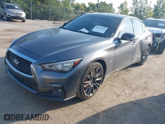 2020 Infiniti Q50 Red Sport 400 with VIN JN1FV7AR8LM660823, listed as a IAAI auction lot 40322341 with 104,530 mi miles and . Bid and sale history available at carsss.com. Image 17.